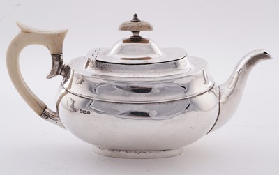 Lot 15 - A George V silver four piece tea service; and an Elizabeth II silver salver