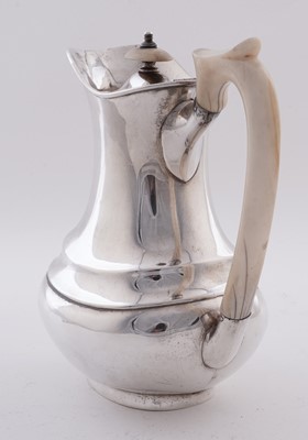 Lot 15 - A George V silver four piece tea service; and an Elizabeth II silver salver