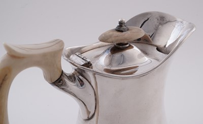 Lot 15 - A George V silver four piece tea service; and an Elizabeth II silver salver
