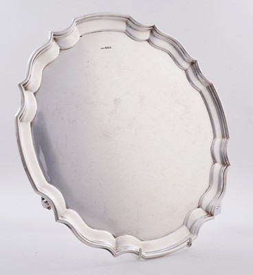 Lot 15 - A George V silver four piece tea service; and an Elizabeth II silver salver