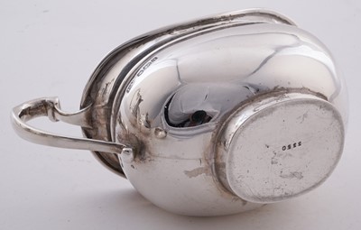 Lot 15 - A George V silver four piece tea service; and an Elizabeth II silver salver