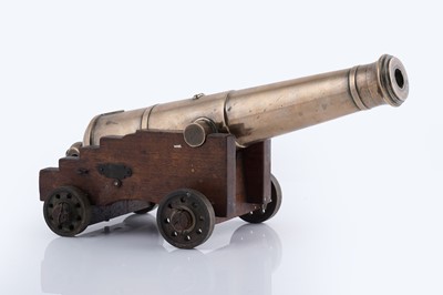 Lot 1037 - A bronze scale-model of a table cannon
