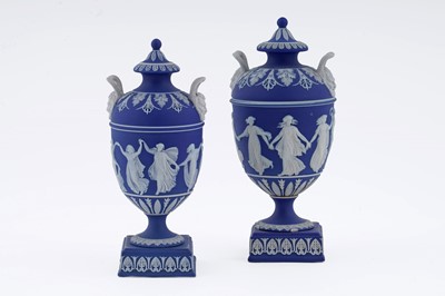 Lot 881 - Two Wedgwood vases and covers