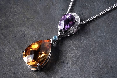Lot 117 - A modern citrine, diamond and amethyst pendant