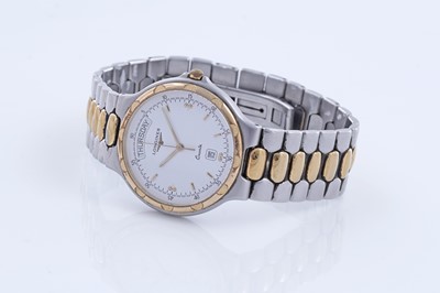 Lot 334 - Longines Conquest: a steel and gilt cased quartz wristwatch