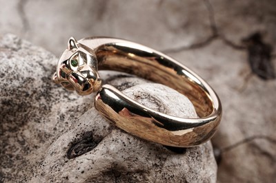 Lot 906 - Cartier: and 18ct yellow gold Panthère de Cartier ring