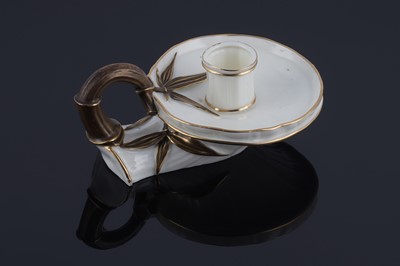 Lot 870 - A Royal Worcester chamber stick