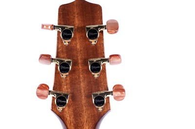Lot 83 - A Takamine six string electro acoustic guitar