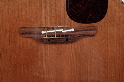 Lot 83 - A Takamine six string electro acoustic guitar