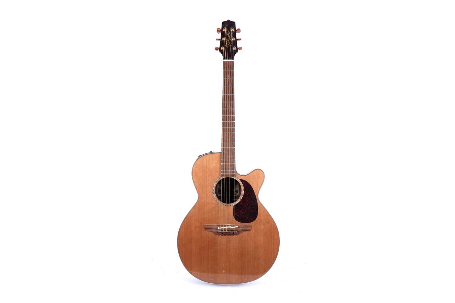Lot 83 - A Takamine six string electro acoustic guitar