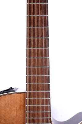 Lot 83 - A Takamine six string electro acoustic guitar