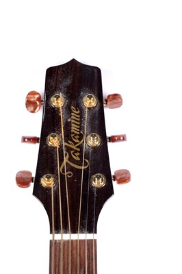 Lot 83 - A Takamine six string electro acoustic guitar
