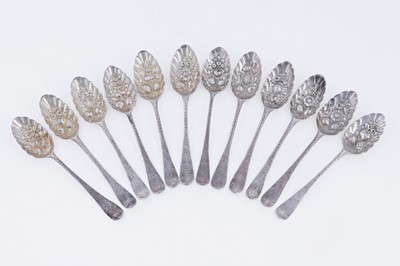 Lot 380 - Twelve Georgian Old English pattern tablespoons with Victorian chased and engraved decoration