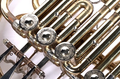 Lot 10 - A Boosey and Hawkes 400 French horn with case