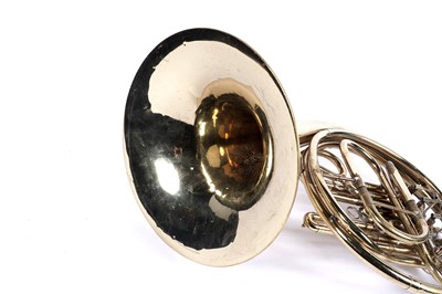 Lot 10 - A Boosey and Hawkes 400 French horn with case