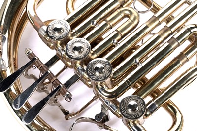 Lot 10 - A Boosey and Hawkes 400 French horn with case