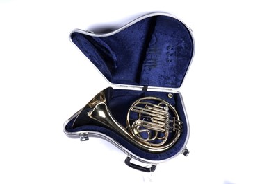 Lot 10 - A Boosey and Hawkes 400 French horn with case