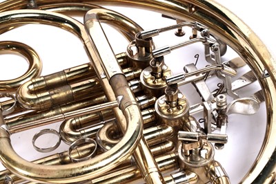 Lot 10 - A Boosey and Hawkes 400 French horn with case