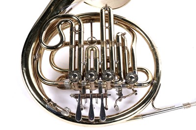 Lot 10 - A Boosey and Hawkes 400 French horn with case
