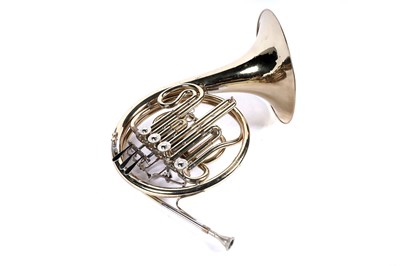 Lot 10 - A Boosey and Hawkes 400 French horn with case