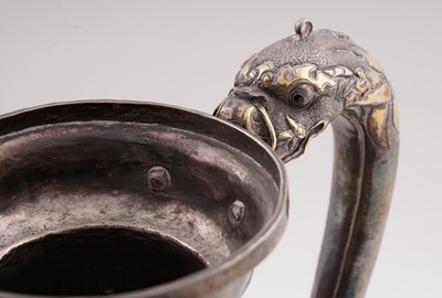 Lot 41 - A 19th Century Tibetan silver ewer