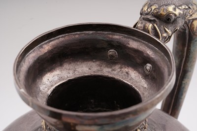 Lot 41 - A 19th Century Tibetan silver ewer
