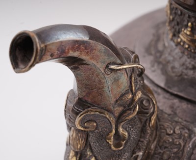 Lot 41 - A 19th Century Tibetan silver ewer