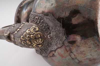 Lot 41 - A 19th Century Tibetan silver ewer
