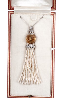 Lot 678 - An early 20th Century seed pearl, quartz and diamond pendant