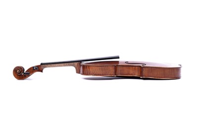 Lot 32 - A violin; and two bows