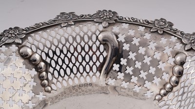 Lot 94 - A graduated pair of late Victorian silver dessert stands or tazzae