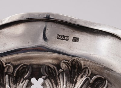 Lot 94 - A graduated pair of late Victorian silver dessert stands or tazzae