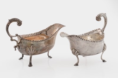 Lot 79 - A pair of George III silver sauceboats
