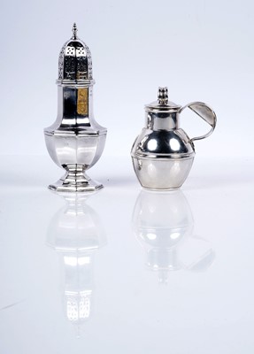 Lot 210 - George V silver sugar caster; and an Elizabeth II silver Guernsey milk can