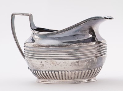 Lot 103 - A late Victorian/Edwardian silver three-piece tea set
