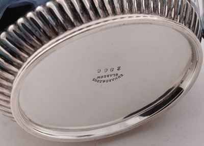 Lot 103 - A late Victorian/Edwardian silver three-piece tea set