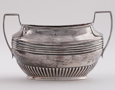 Lot 103 - A late Victorian/Edwardian silver three-piece tea set