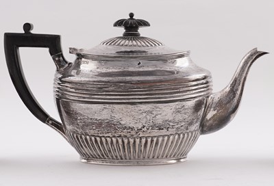 Lot 103 - A late Victorian/Edwardian silver three-piece tea set