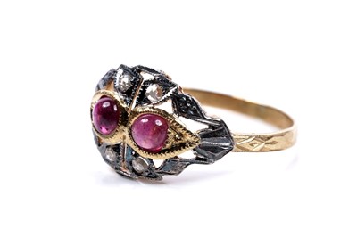 Lot 113 - A ruby and diamond ring