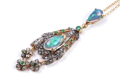Lot 51 - A water-opal, emerald and diamond pendant