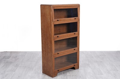 Lot 26 - An early 20th Century Art Deco oak barrister's style bookcase