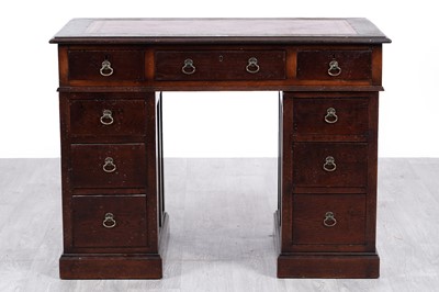 Lot 25 - An early 20th Century oak pedestal desk