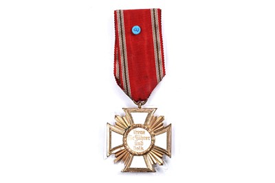 Lot 973 - A display of three German Third Reich Long Service Awards of the NSDAP