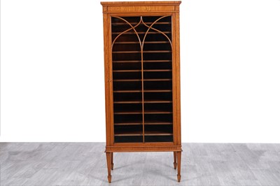 Lot 17 - A fine Edwardian inlaid satinwood and walnut banded music cabinet