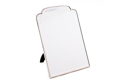 Lot 12 - A George V silver mounted toilet mirror