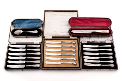 Lot 233 - Three cased sets of six silver-handled tea knives; and a late Victorian silver cake knife