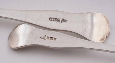 Lot 234 - George V eleven silver table forks and twelve silver dessert forks; and a later silver table fork