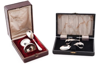 Lot 338 - A George V silver novelty, child's pusher and spoon; and a cased French silver egg-cup and spoon