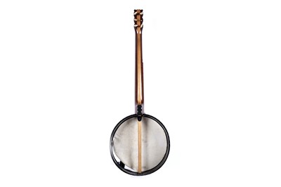 Lot 61 - A seven-string banjo