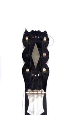 Lot 61 - A seven-string banjo